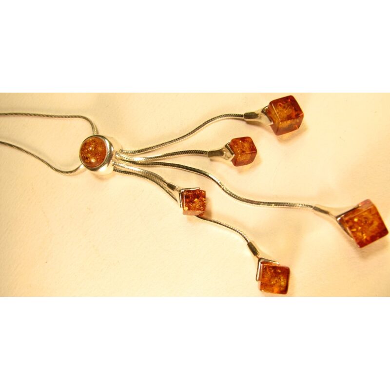 5 strand amber pendant on a silver chain.