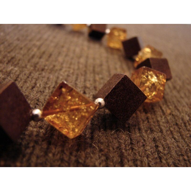 Hone Baltic amber cube and choclate color enamel coated silver cube chocker.