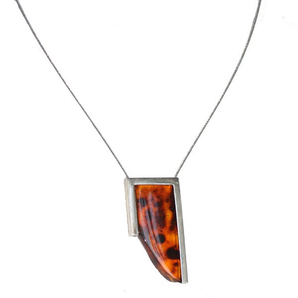 Amber necklace of unevenly cut cognac amber with inclusions in silver frame