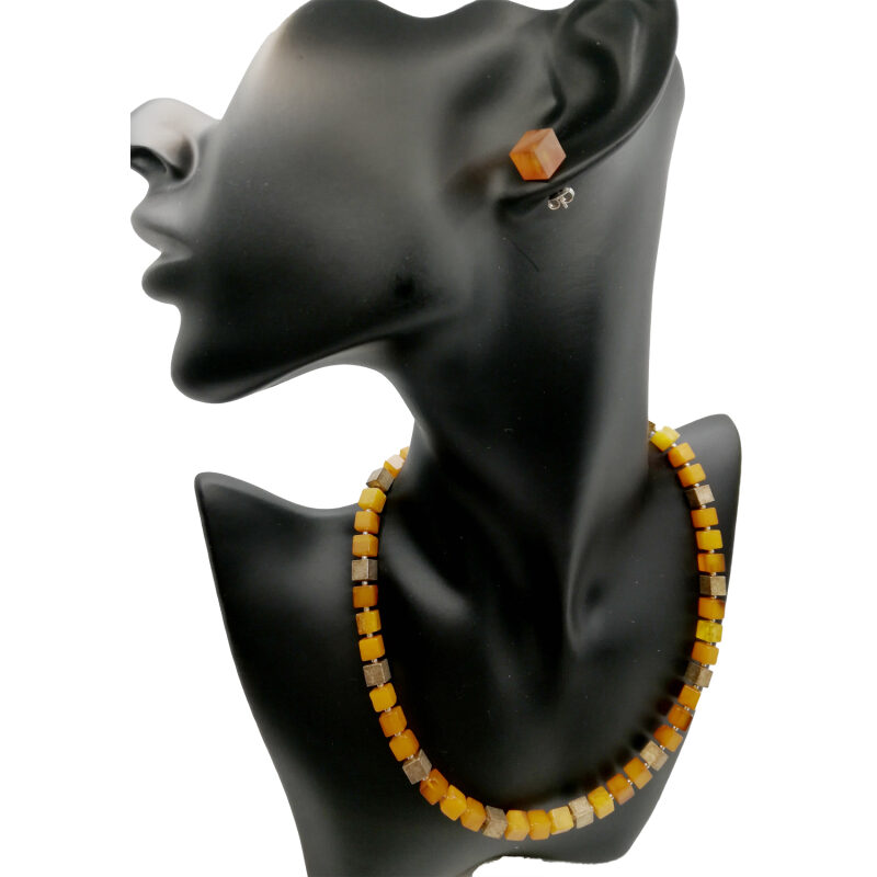 Amber necklace and earrings on mannequin