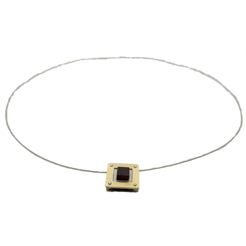 Modern Amber necklace with Cherry cube surrounded by golden frame