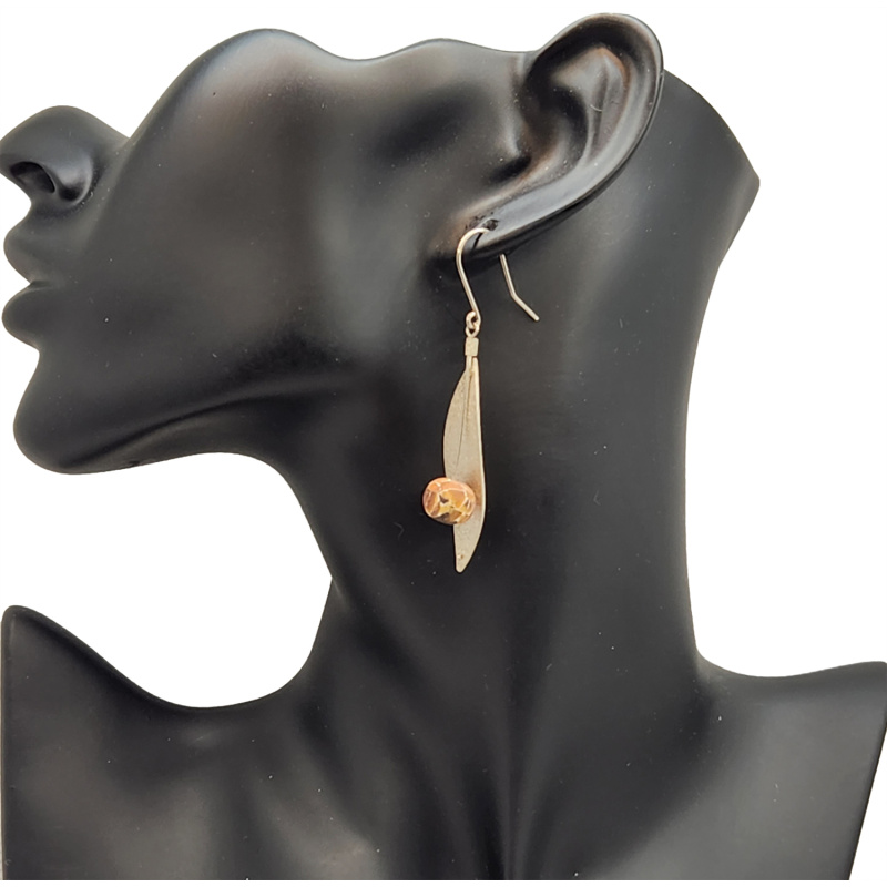 Elongated silver leaf earring with hanging marbelized amber ball