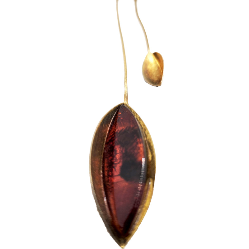 Chocker with golden leaves filled with honey amber